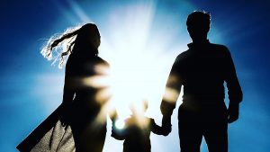 man and woman holding hands